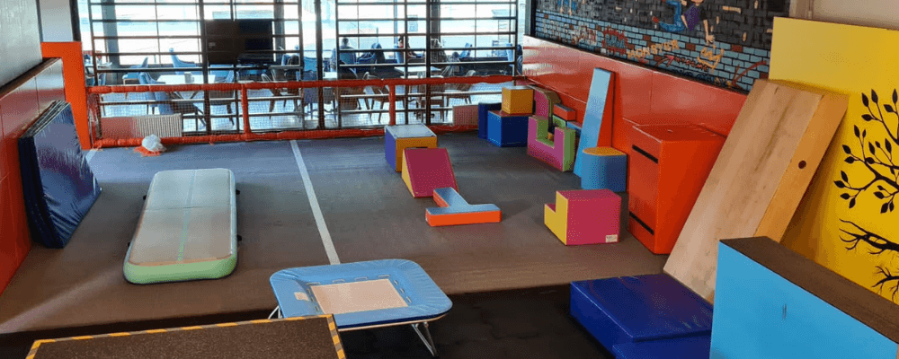 HerYerParkour facility equipment detail - airtrack foam pit and gymnastics equipment